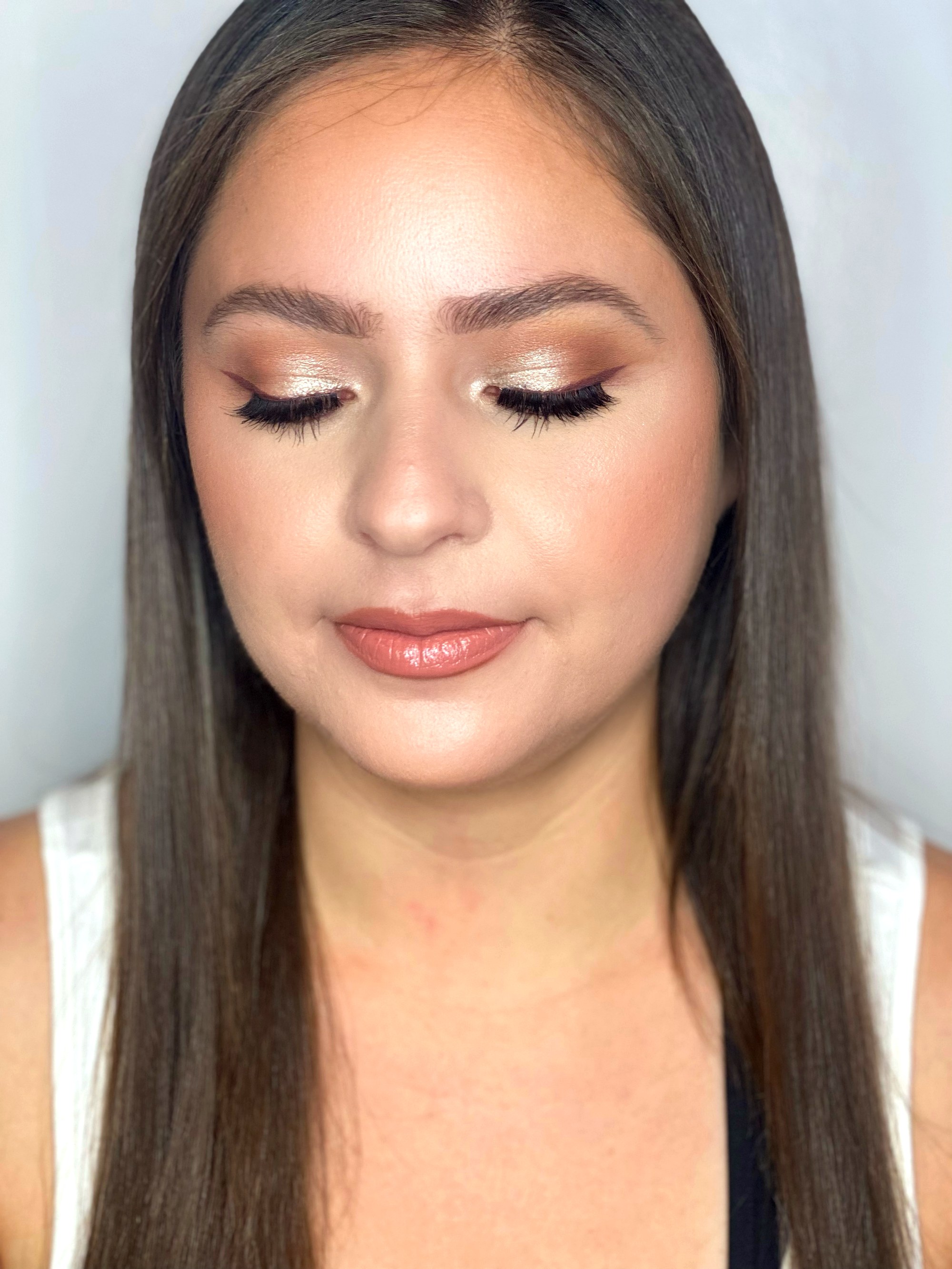 Soft bridal glow — copper shimmer, romantic lashes, and flawless skin
